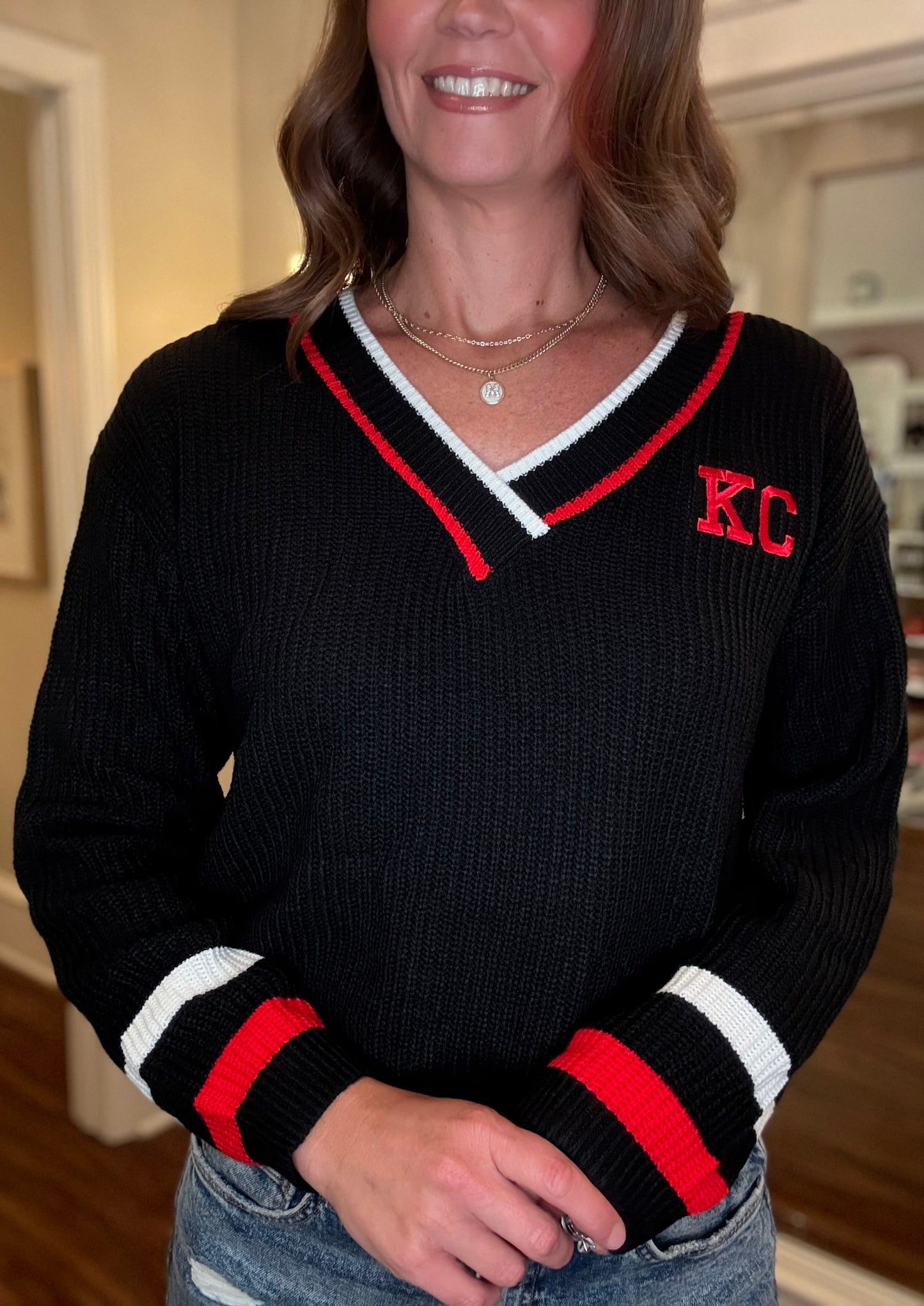 KC BLACK AND RED V-NECK SWEATER 8.29
