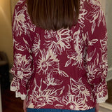 FLORAL PRINTED BLOUSE WITH FLUTTER HEM 12.23