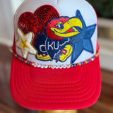 RED KU PATCH TRUCKER HAT 11.14