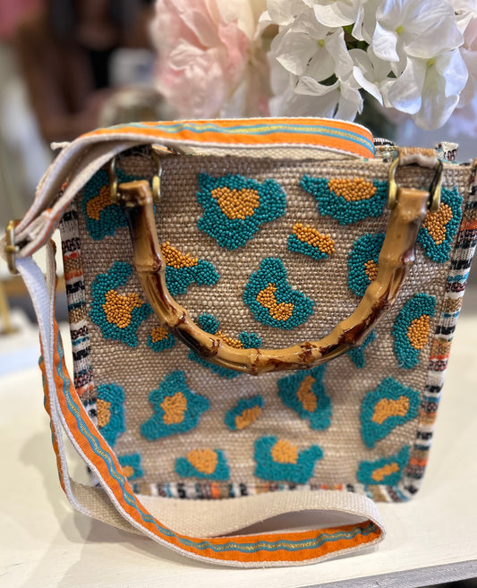 Turquoise beaded purse with bamboo strap